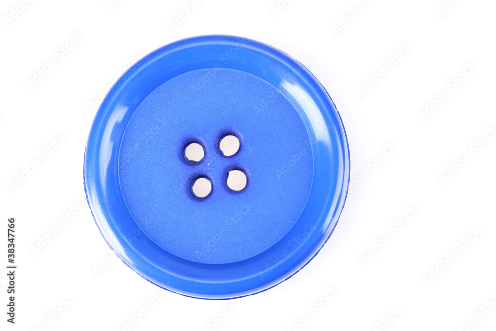 Close up of sewing button isolated on white Close up of sewing button isolated on white