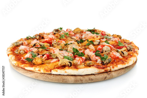 Delicious pizza with seafood on wooden stand isolated on white