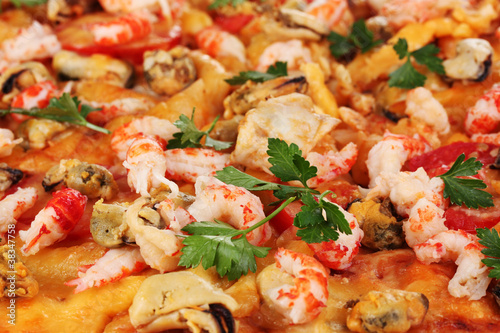 Delicious pizza with seafood  closeup