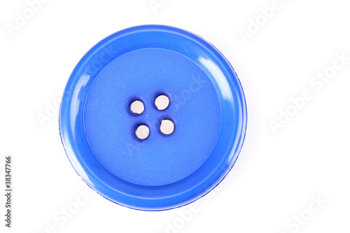 Close up of sewing button isolated on white