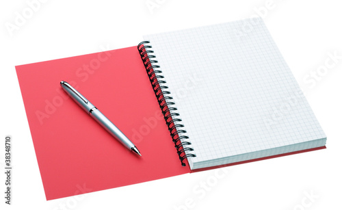 Silver pen and notebook with red cover isolated on white