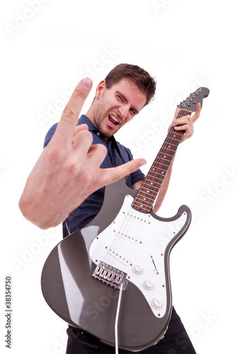 rockstar holding an electric guitar photo