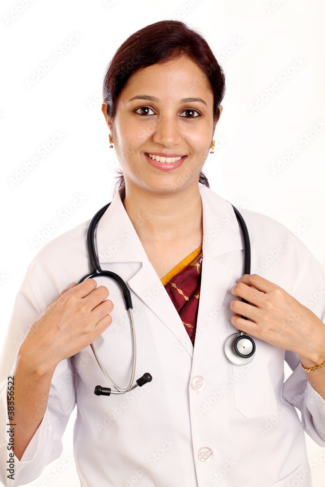 Smiling Indian doctor woman holding stethoscope Smiling Indian doctor woman holding stethoscope