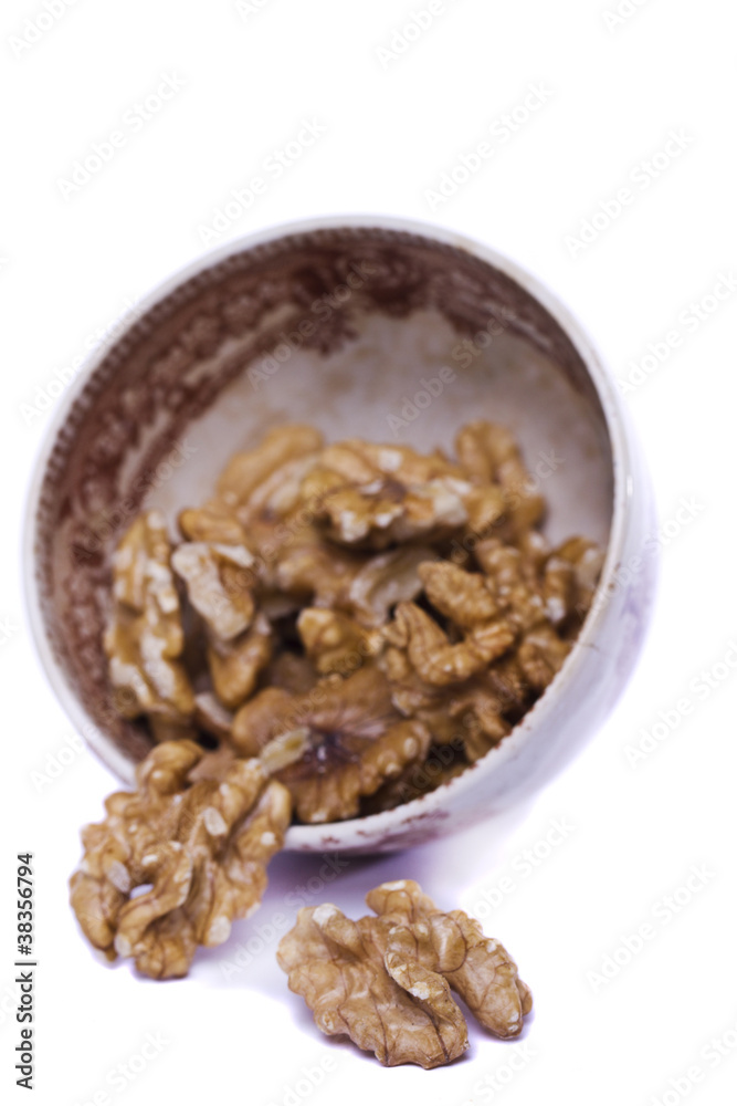 walnuts on a bowl walnuts on a bowl