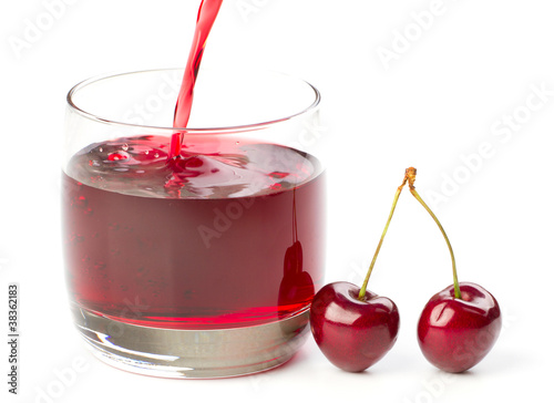 Wallpaper Mural Cherries and a glass of cherry juice isolated on white Torontodigital.ca