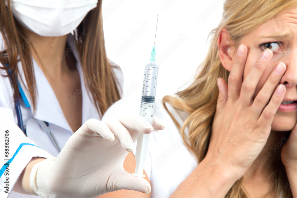 nurse hand with syringe needle fear of injections nurse hand with syringe needle fear of injections