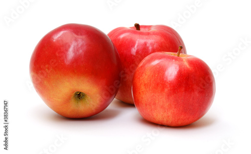 fresh red apples isolated on white background