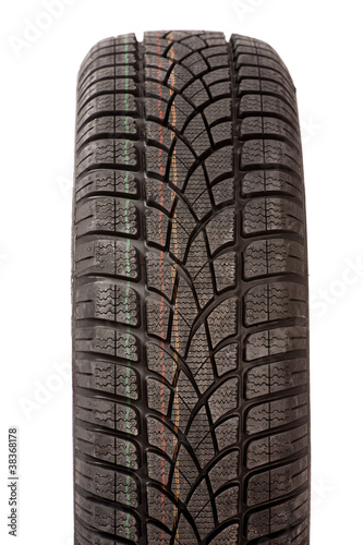 New car tire on white background