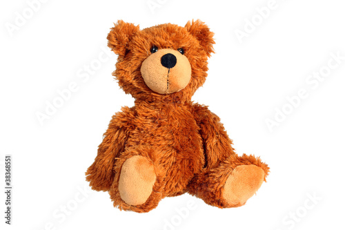 Sitting teddy bear isolated over white with clipping path photo