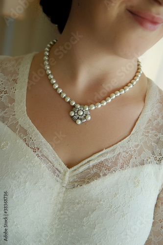 woman with pearl necklace