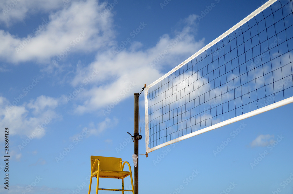 Sport Image Of A Volleyball Net On A Beach With A Referees Chair