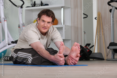 a man doing fitness at home