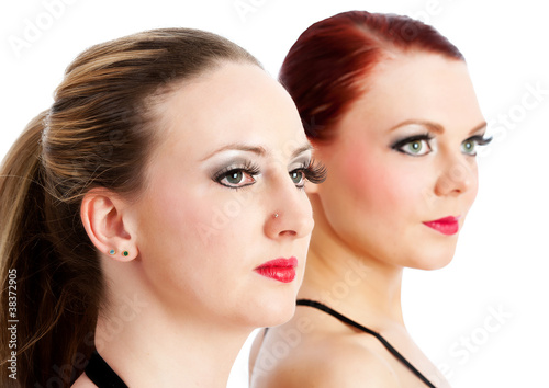Two beautiful young dancers head shot isolated
