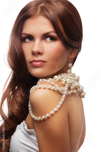 Yung woman with  pearls necklace