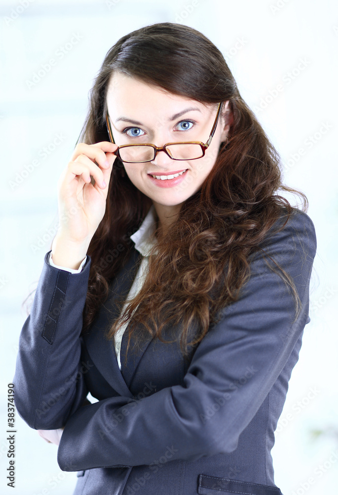 Portrait of a pretty young business lady in spectacles Portrait of a pretty young business lady in spectacles