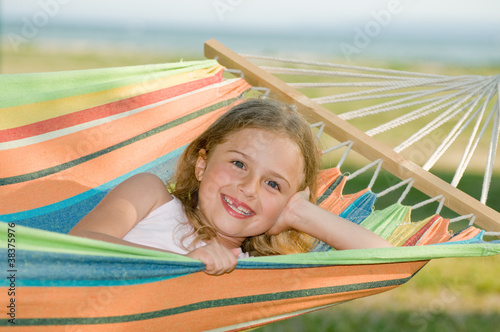 Lovely girl in colorful hammock © Gorilla