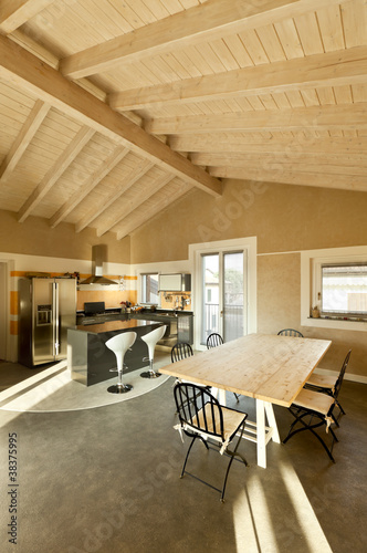 interior, new loft furnished, view of dining table and kitchen