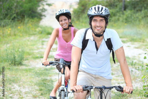 Couple enjoying bike ride