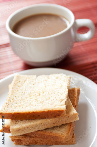 A cup of coffee and bread