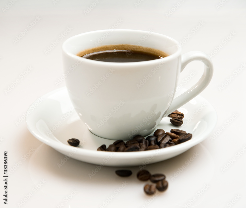 Cup of coffee and beans over white background Cup of coffee and beans over white background