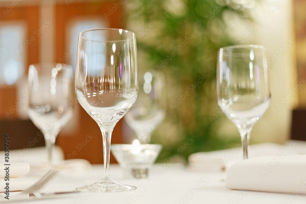 Tables set for meal Tables set for meal