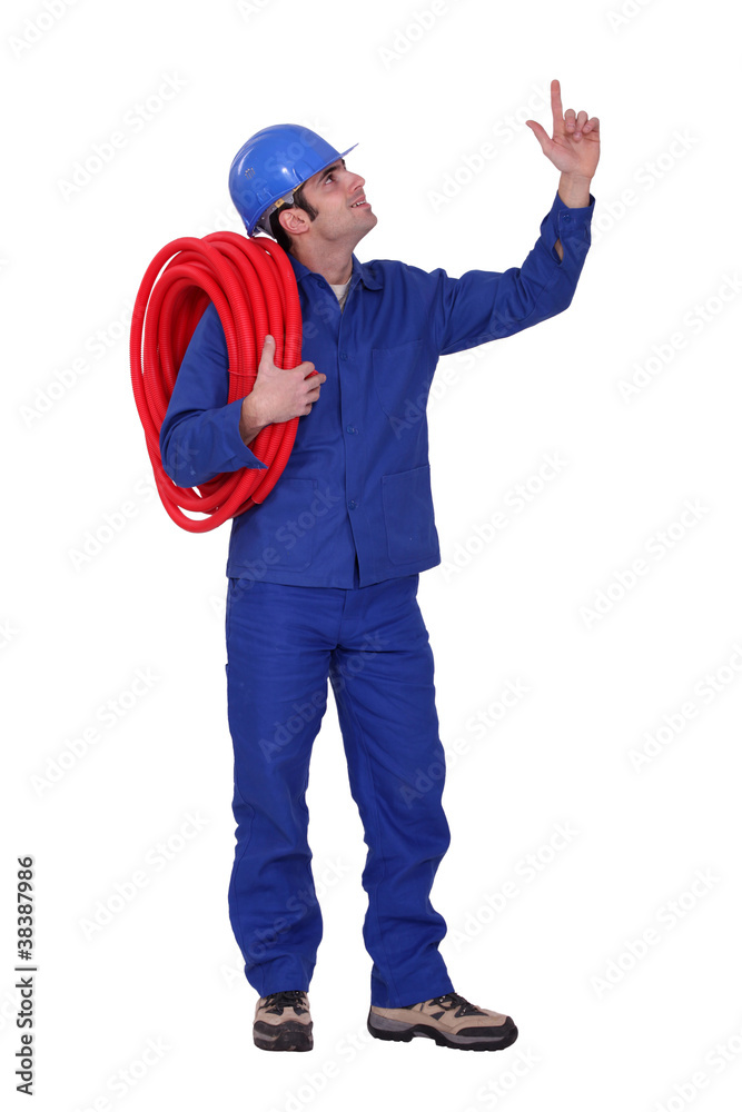 Plumber pointing upwards Plumber pointing upwards