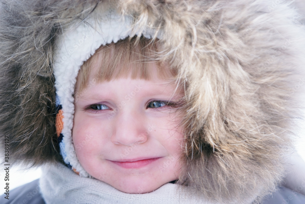 Happy smiling boy in winter clothes Happy smiling boy in winter clothes