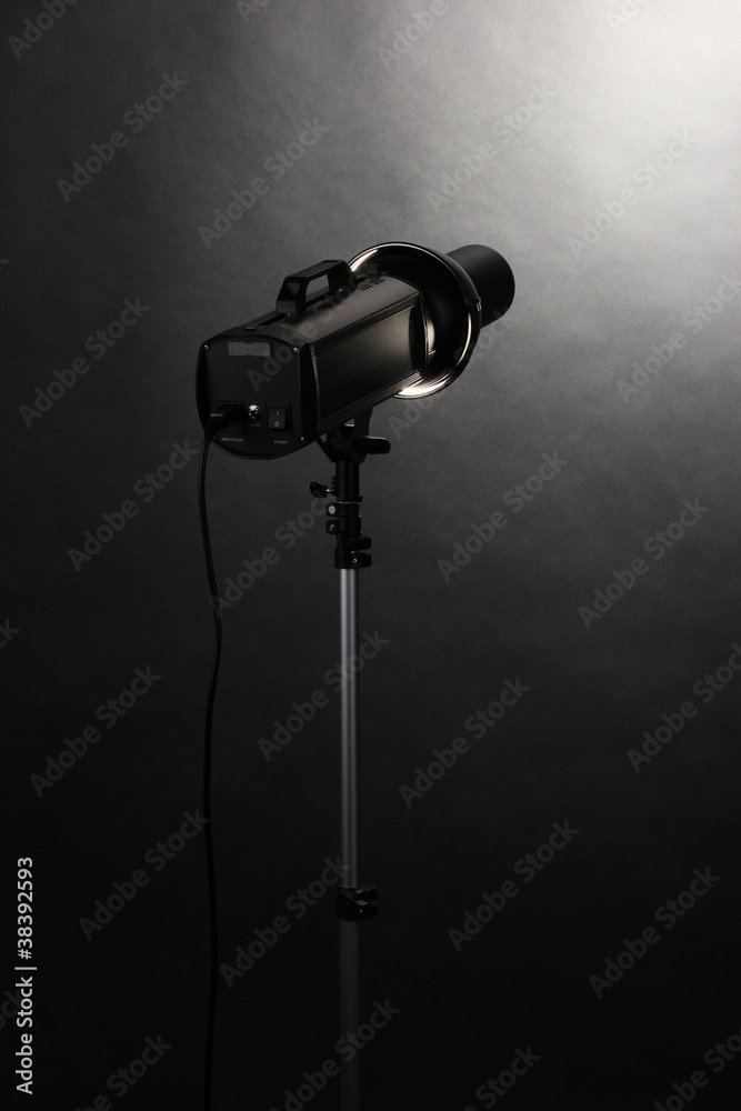 Studio flash on grey background Studio flash on grey background
