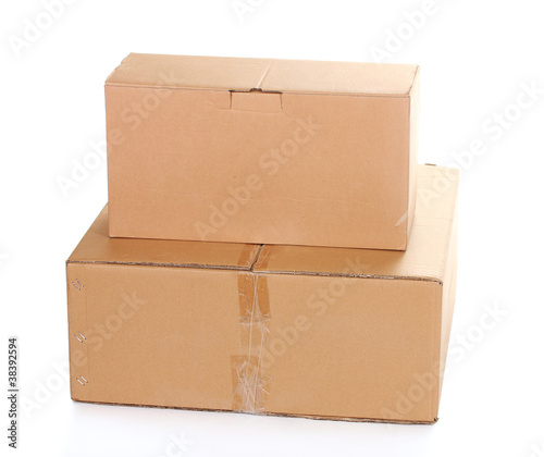 two closed cardboard boxes isolated on white © Africa Studio