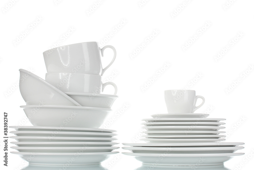 empty bowls, plates and cups isolated on white empty bowls, plates and cups isolated on white