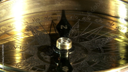 Golden compass closeup