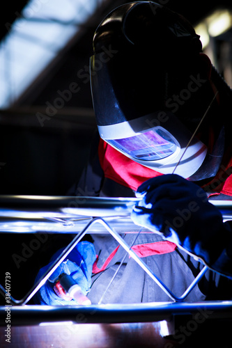 WELDER AT WORK (color toned image; shalow DOF) photo