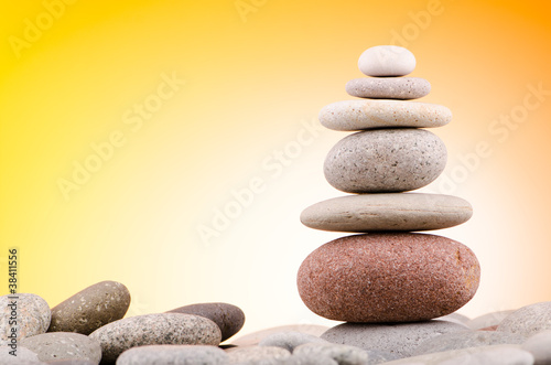 Pebbles stack against gradient background