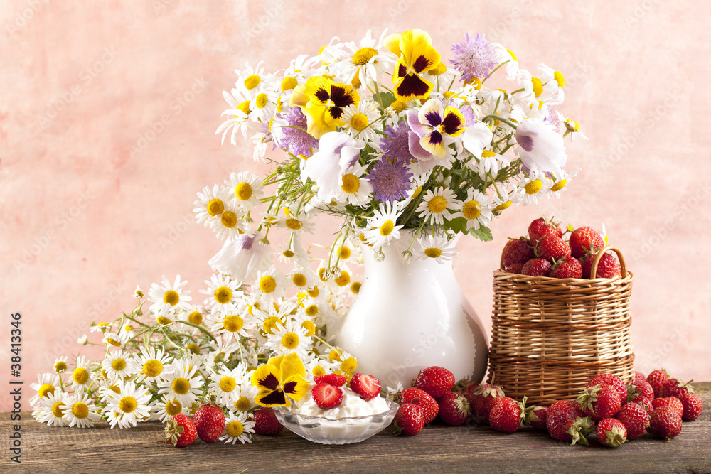 strawberries and bouquet of  flowers