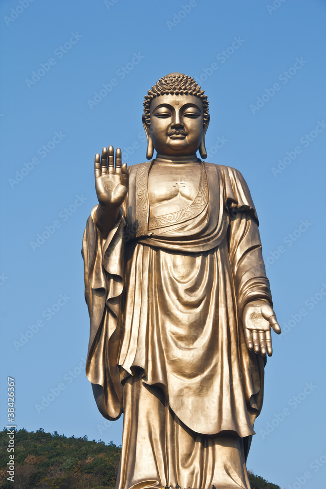 Oriental Buddha Statue, against Peaceful sky