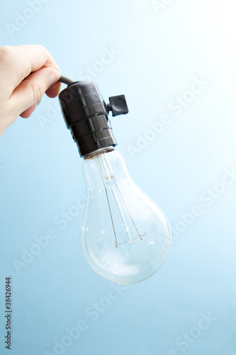 Light bulb on a blue background.