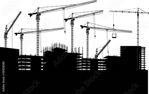 seven cranes and buildings on white