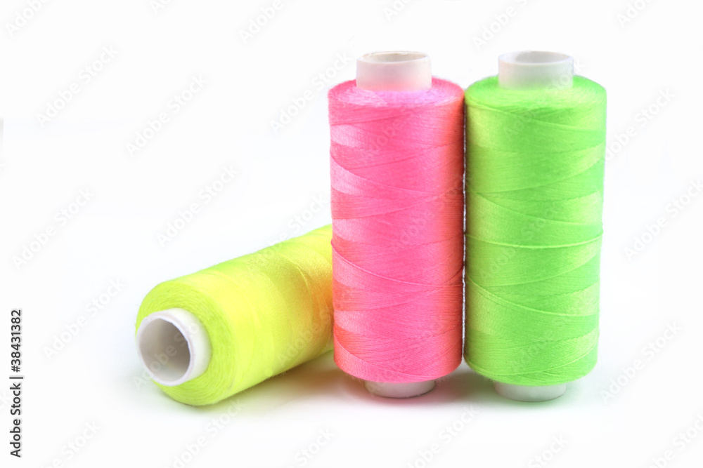 three nice colorful bobbins