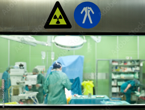 Warning signs busy surgery