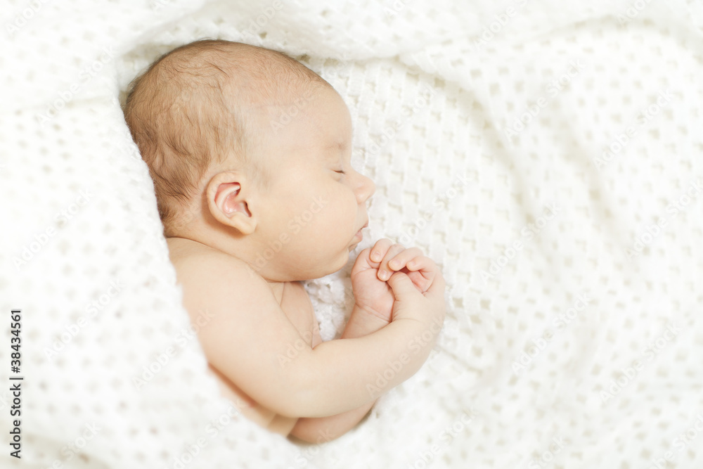 Sleeping baby covered with white blanket Sleeping baby covered with white blanket