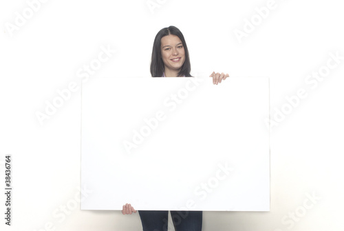 ragazza con cartello bianco photo
