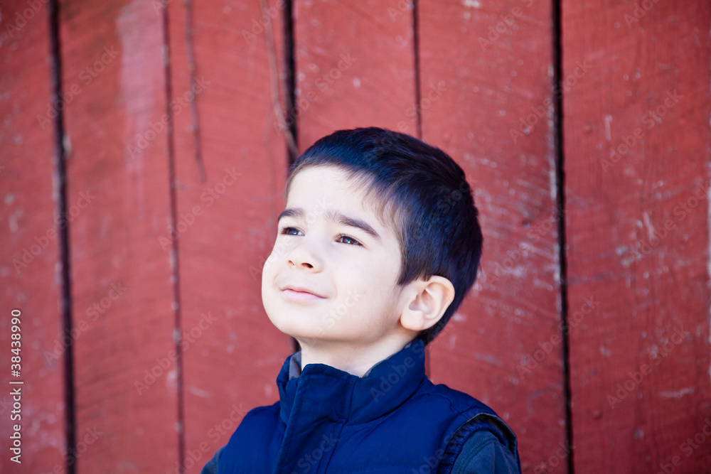 Little Boy Joyfully Gazing Up at the Sky Little Boy Joyfully Gazing Up at the Sky