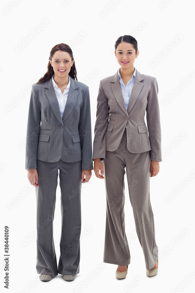 Two businesswomen smiling Two businesswomen smiling