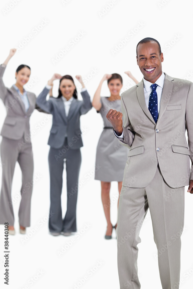 Successful business team with a happy businessman in foreground Successful business team with a happy businessman in foreground