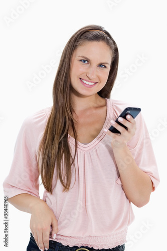Close-up of a girl holding a mobile phone