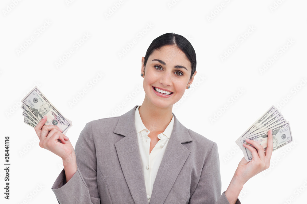 Smiling saleswoman with money in her hands Smiling saleswoman with money in her hands