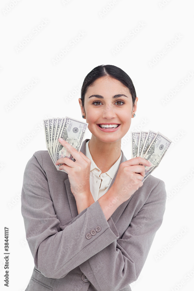 Smiling tradeswoman with money in her hands Smiling tradeswoman with money in her hands