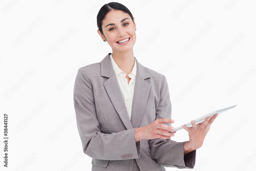 Smiling young saleswoman with her tablet computer Smiling young saleswoman with her tablet computer