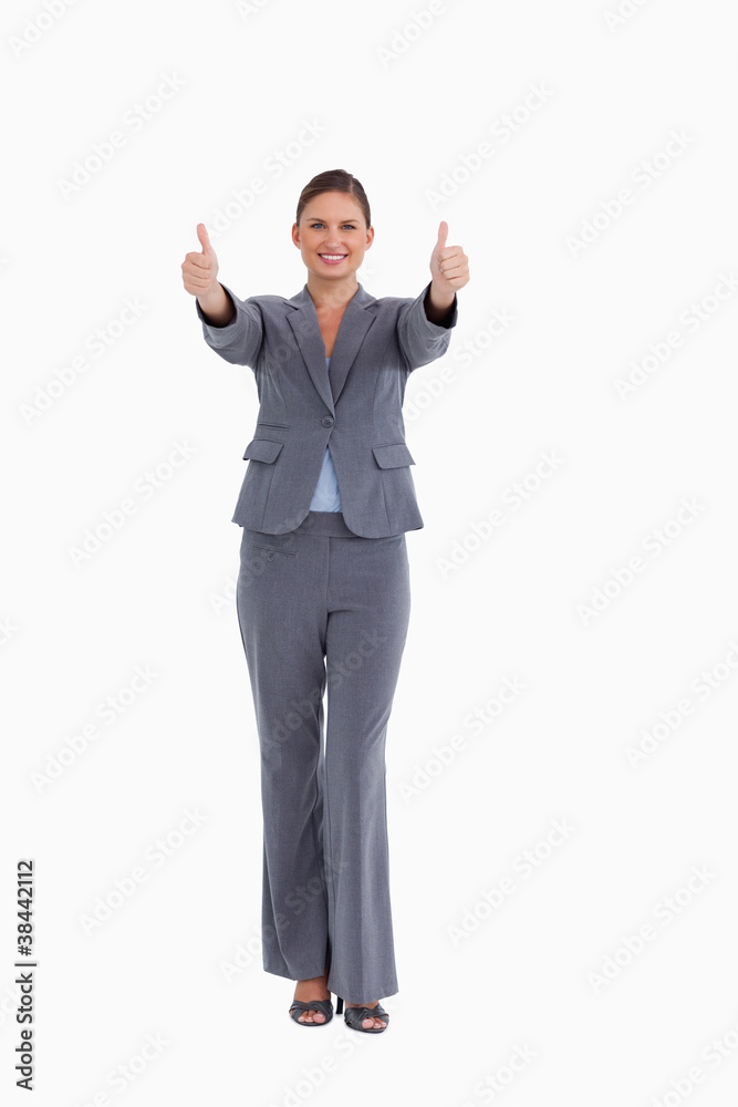 Smiling tradeswoman giving thumbs up Smiling tradeswoman giving thumbs up