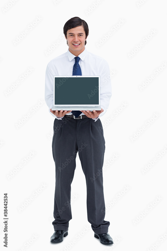 Smiling tradesman presenting screen of his laptop Smiling tradesman presenting screen of his laptop